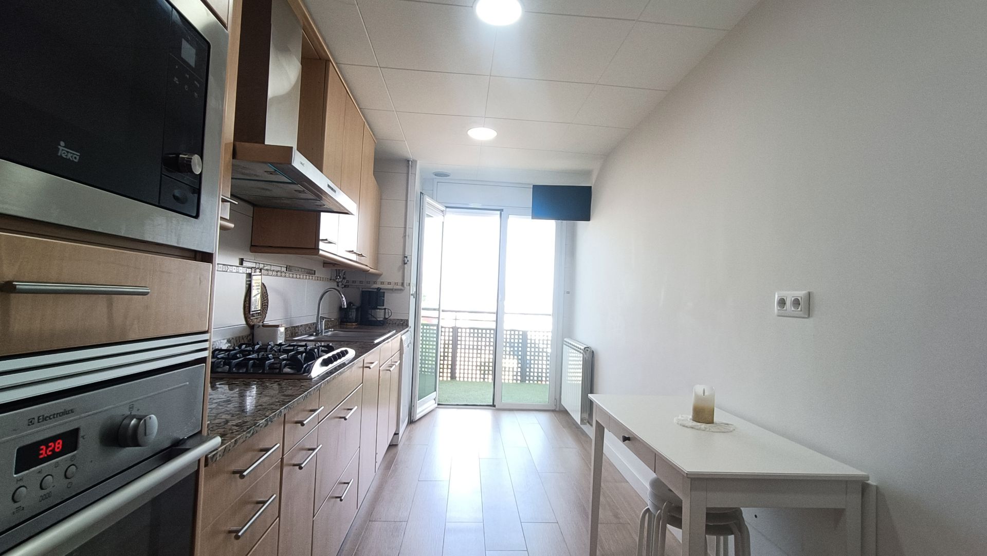 Cuina de Pis de lloguer en Blanes amb Calefacció, Terrassa i Moblat
