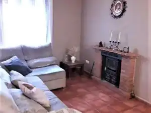 Sala de estar de Casa adosada de alquiler en Arriate con Aire acondicionado, Calefacción y Piscina