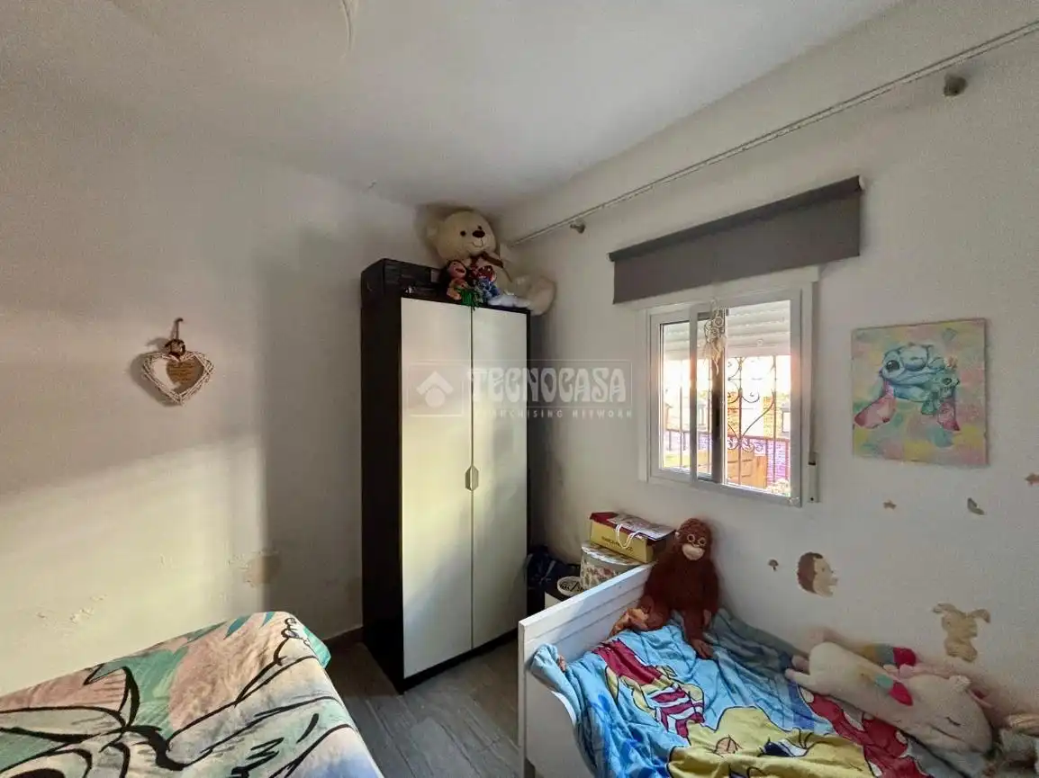 Dormitori de Casa adosada en venda en Málaga amb Terrassa i Traster