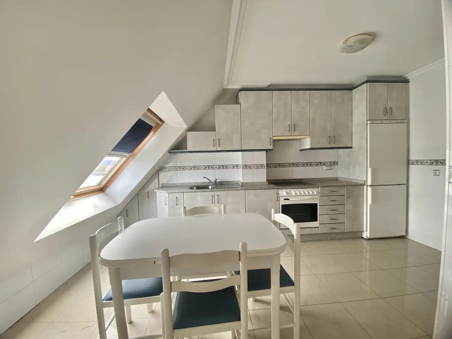 Kitchen of Attic for sale in O Grove    with Parquet flooring, Terrace and Storage room