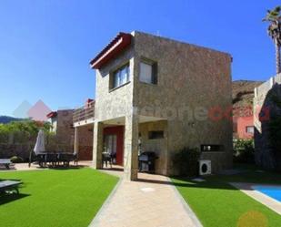 Exterior view of House or chalet for sale in Mogán  with Air Conditioner, Terrace and Swimming Pool
