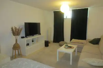 Sala d'estar de Casa adosada en venda en Mijas amb Terrassa, Piscina i Moblat