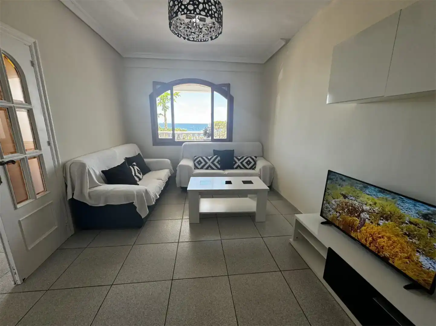 Sala d'estar de Casa o xalet de lloguer en Cartagena amb Aire condicionat, Jardí privat i Moblat
