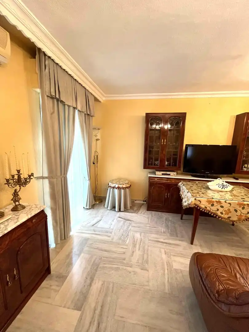 Sala de estar de Casa adosada en venta en Moguer con Aire acondicionado, Terraza y Trastero