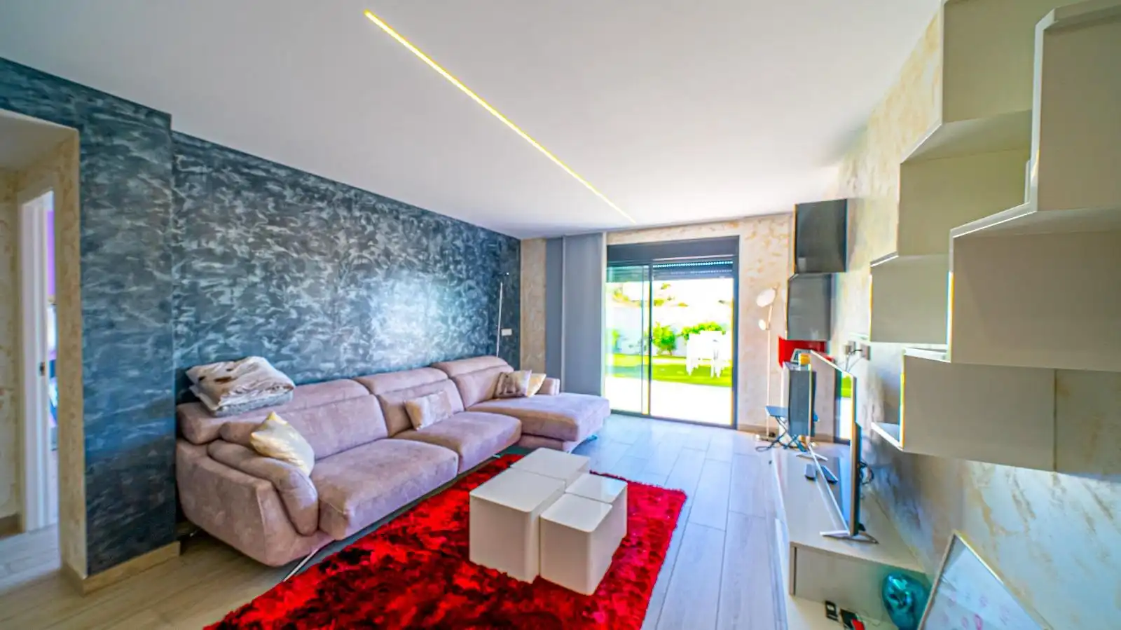 Sala d'estar de Casa adosada en venda en Finestrat amb Aire condicionat, Calefacció i Jardí privat