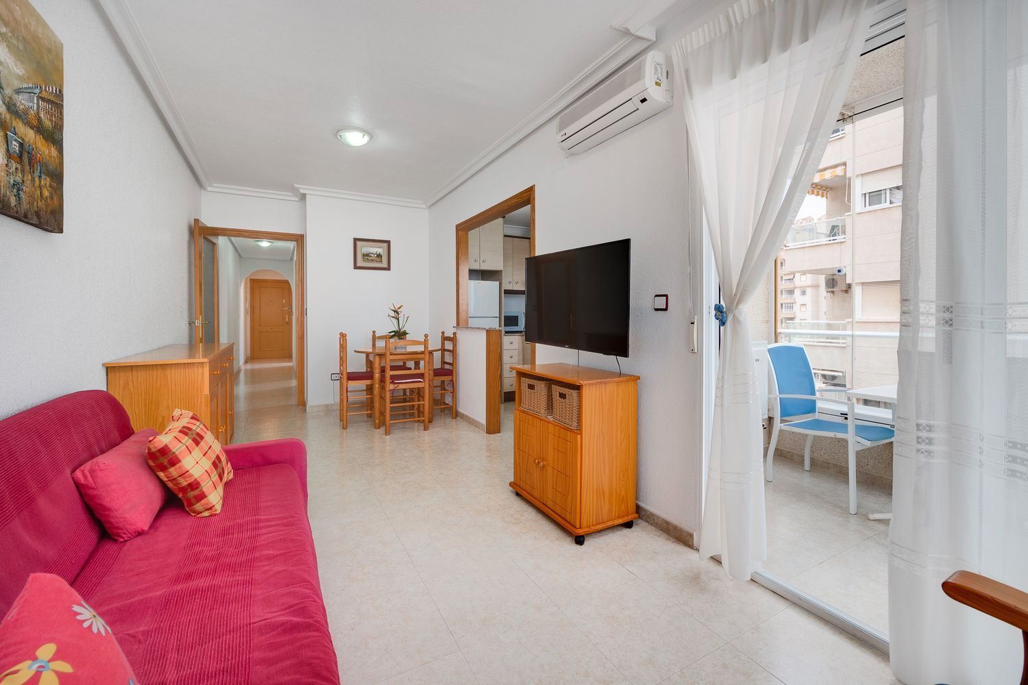 Sala de estar de Piso en venta en Torrevieja con Aire acondicionado, Amueblado y Piscina comunitaria