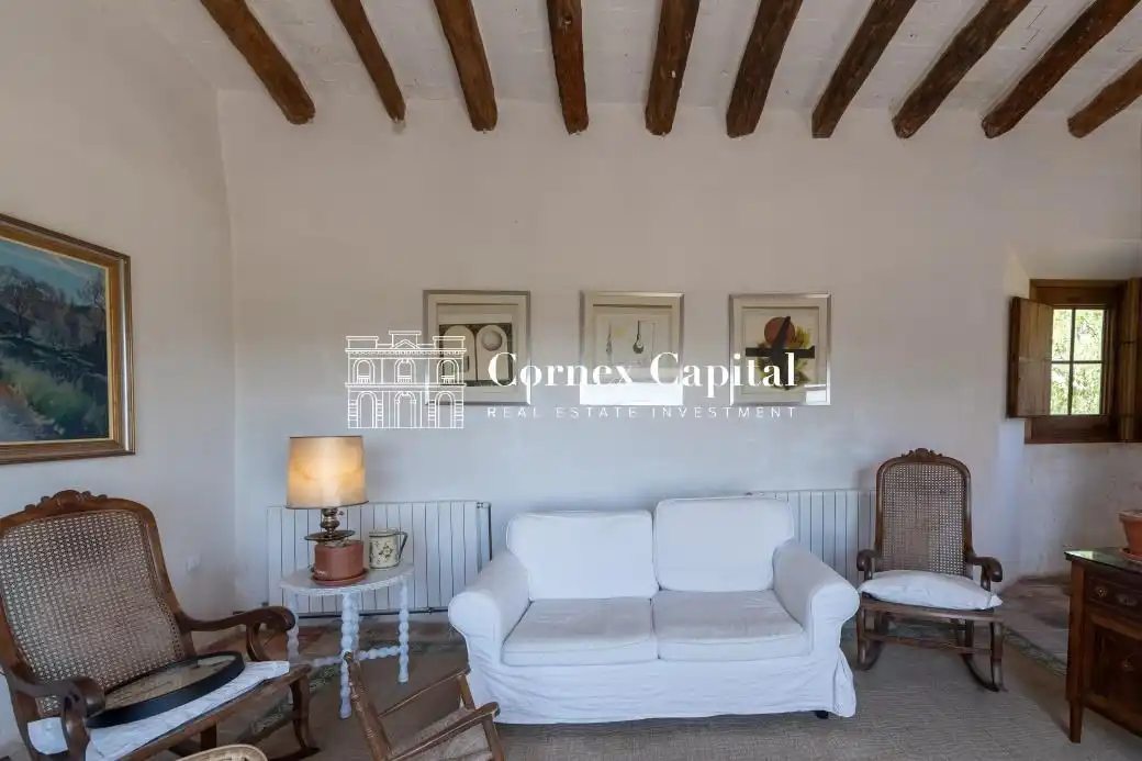 Sala de estar de Finca rústica de alquiler en Rupià con Aire acondicionado, Calefacción y Jardín privado