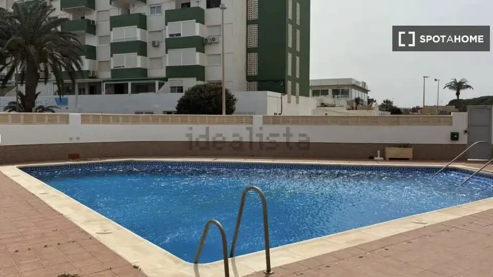 Swimming pool of Apartments for share in Roquetas de Mar  with Air Conditioner, Terrace and Furnished