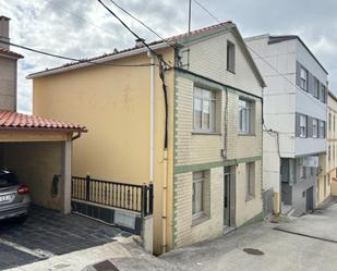 Vista exterior de Casa adosada en venda en Cariño amb Terrassa