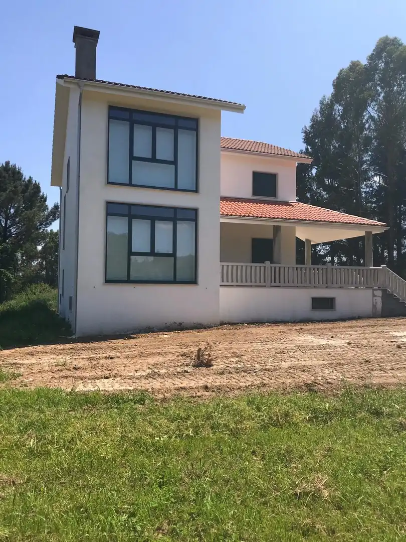 Vista exterior de Casa o xalet en venda en Arzúa amb Jardí privat, Terrassa i Traster