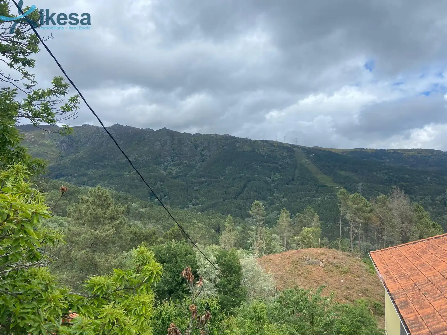 Casa o xalet en venda en Entrimo amb Jardí privat