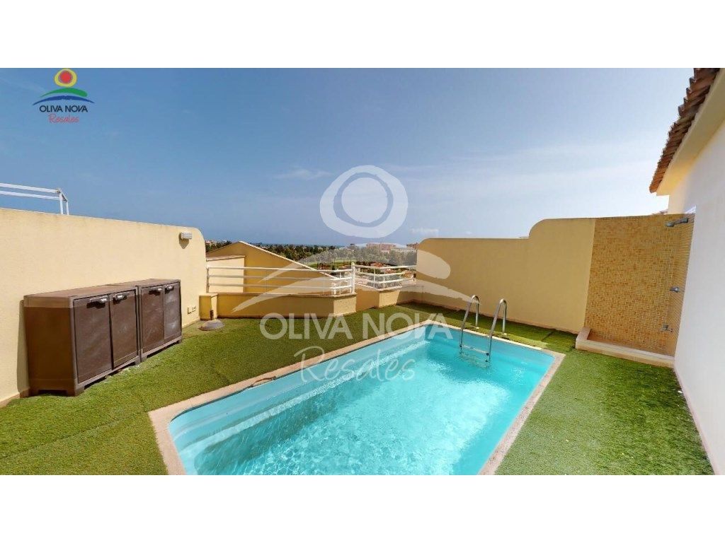 Exterior view of Attic for sale in Oliva  with Terrace, Swimming Pool and Community pool