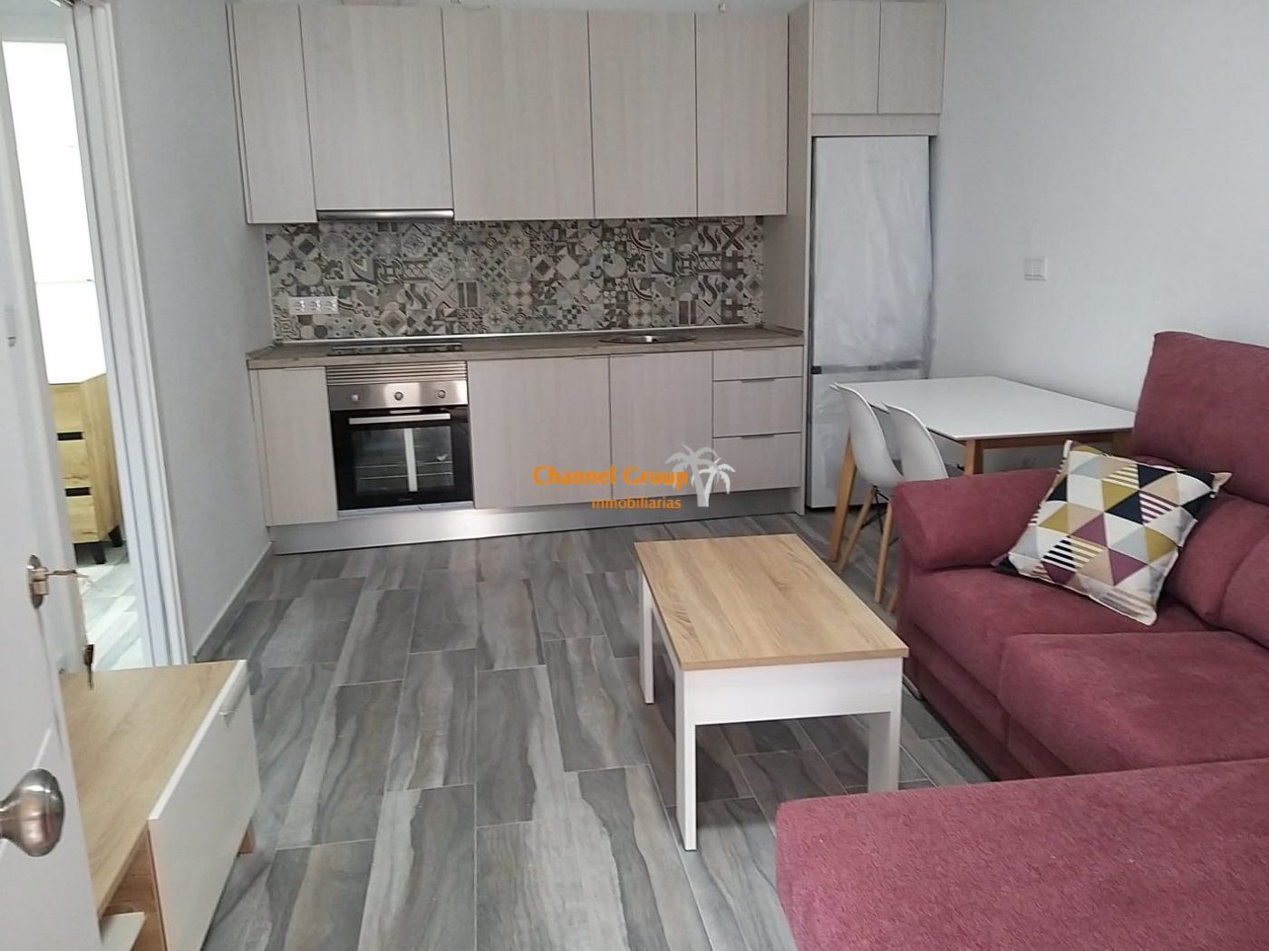 Sala d'estar de Estudi de lloguer en Elche / Elx amb Jardí privat i Piscina comunitària