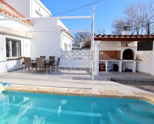 Swimming pool of Single-family semi-detached for sale in Empuriabrava  with Air Conditioner, Terrace and Swimming Pool