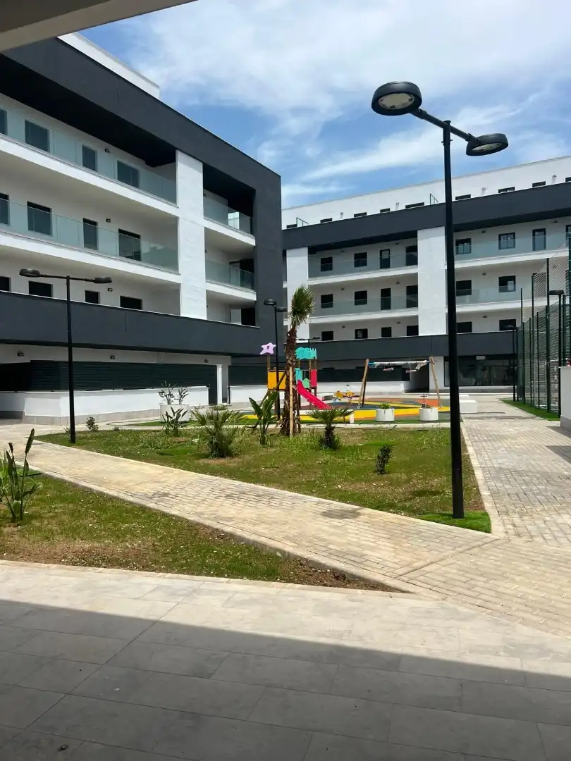 Exterior view of Flat for sale in La Rinconada  with Terrace, Swimming Pool and Balcony