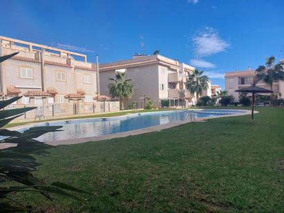 Swimming pool of Planta baja for sale in Águilas  with Air Conditioner, Heating and Private garden