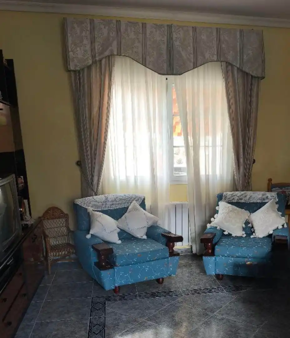 Sala d'estar de Casa adosada en venda en Montearagón amb Aire condicionat i Calefacció