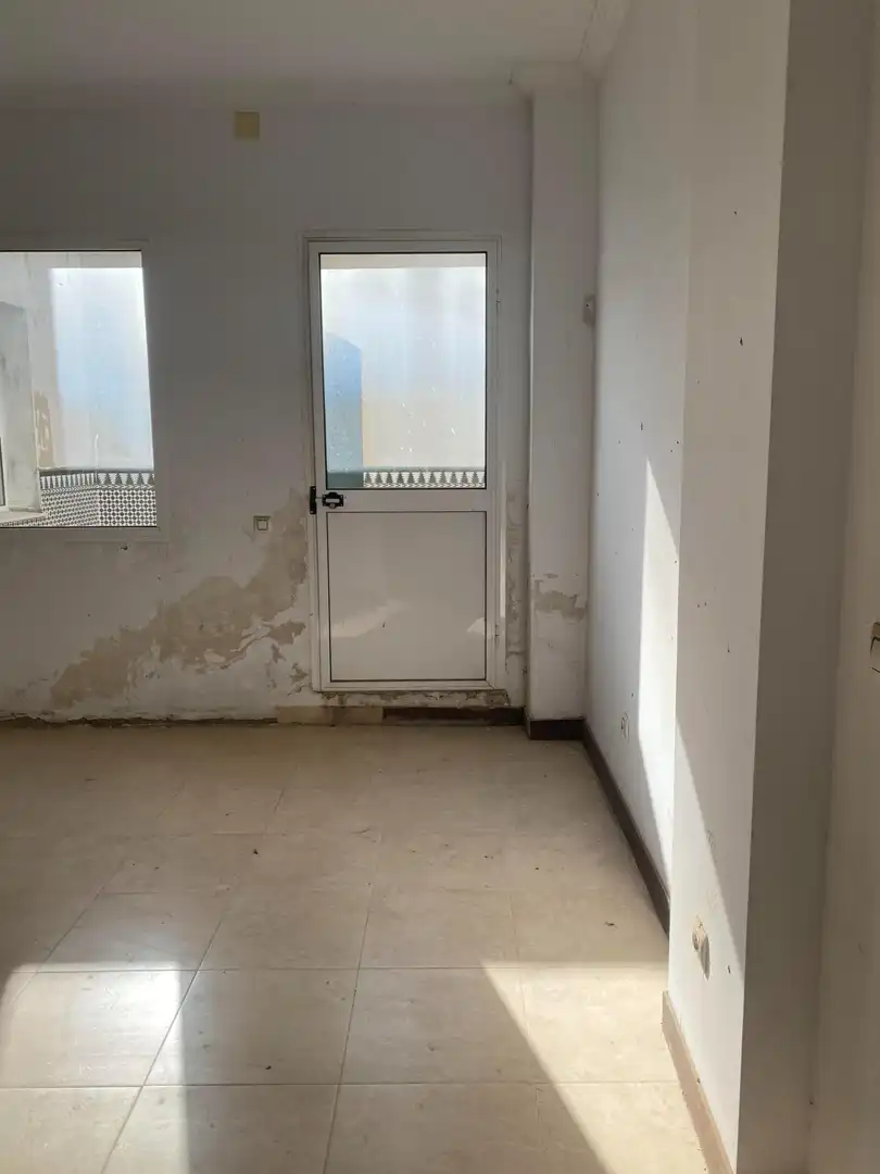 Casa adosada en venda en Coria del Río amb Jardí privat