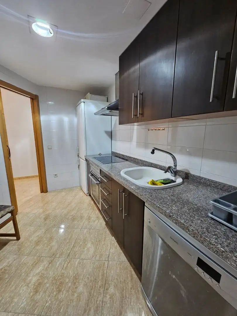 Kitchen of Flat for sale in Simat de la Valldigna  with Air Conditioner, Private garden and Balcony