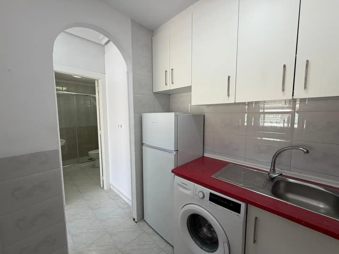 Kitchen of Flat for sale in Torrevieja  with Air Conditioner, Terrace and Community pool