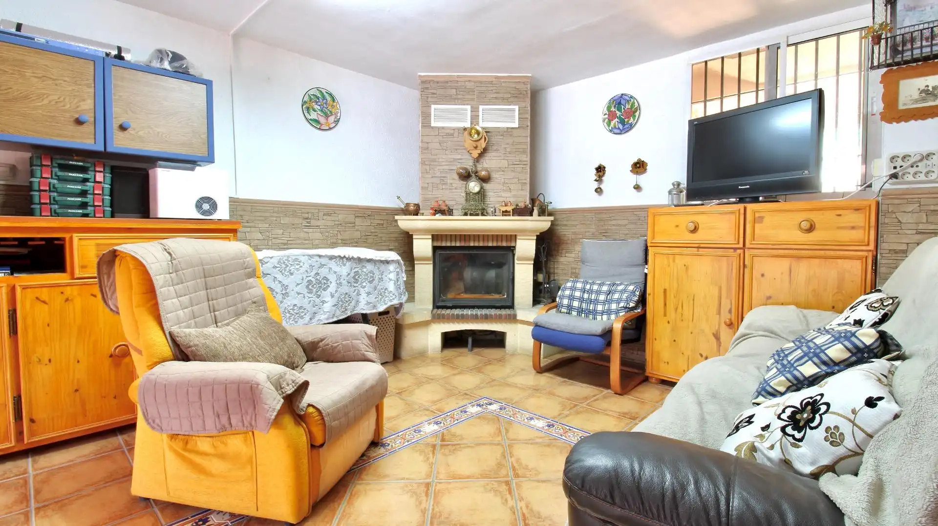 Sala de estar de Casa adosada en venta en Vegas del Genil con Aire acondicionado, Calefacción y Terraza