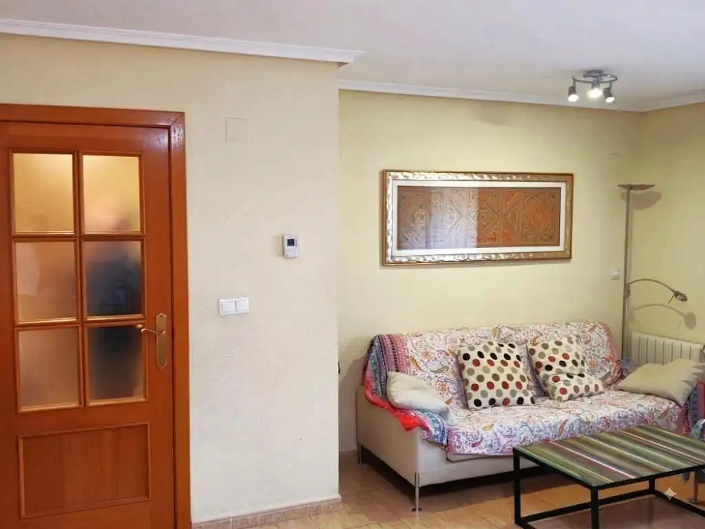 Sala d'estar de Pis en venda en Alicante / Alacant amb Aire condicionat, Calefacció i Jardí privat