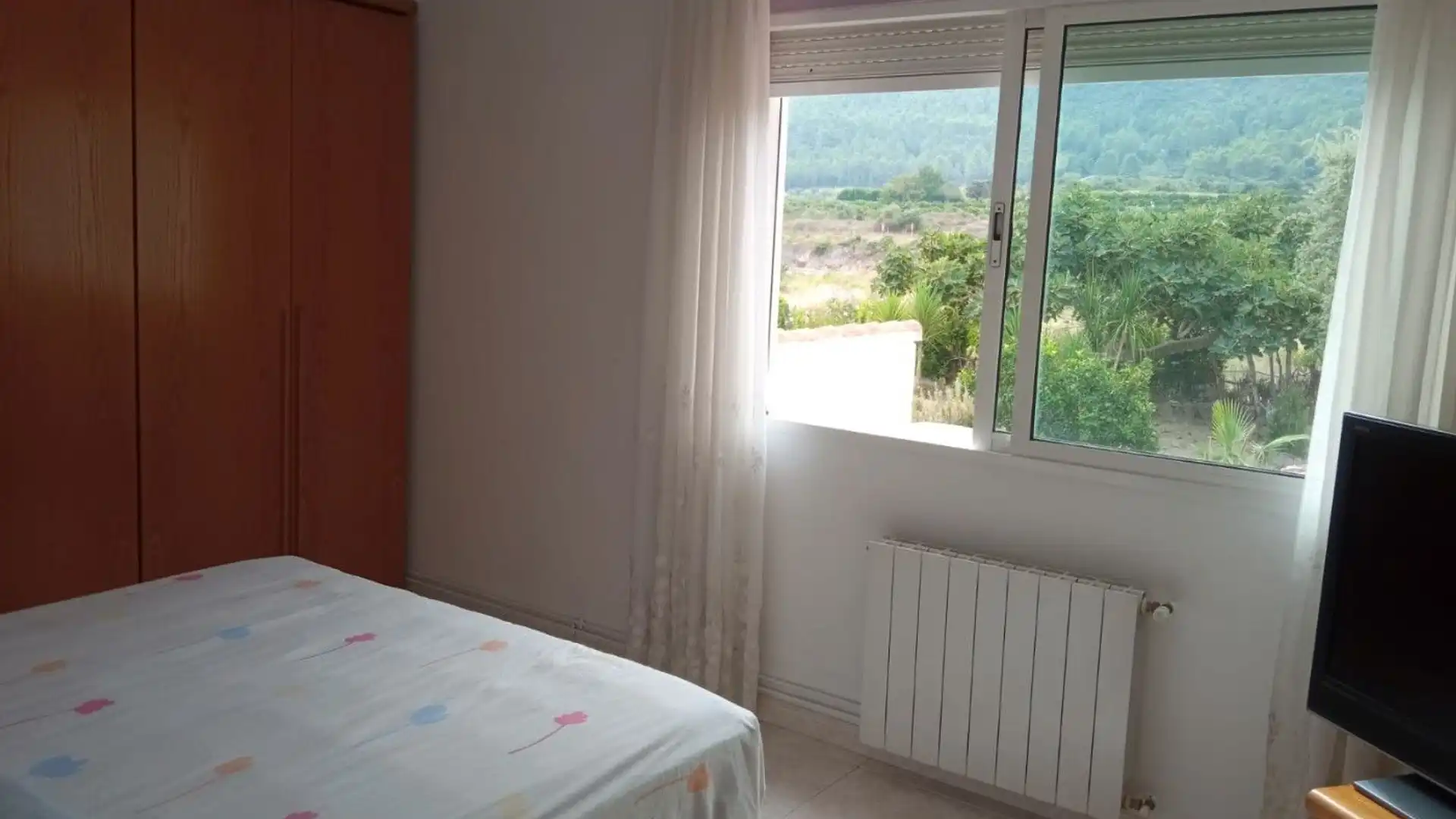 Schlafzimmer von Einfamilien-Reihenhaus zum Verkauf in Llocnou de Sant Jeroni mit Klimaanlage, Heizung und Terrasse