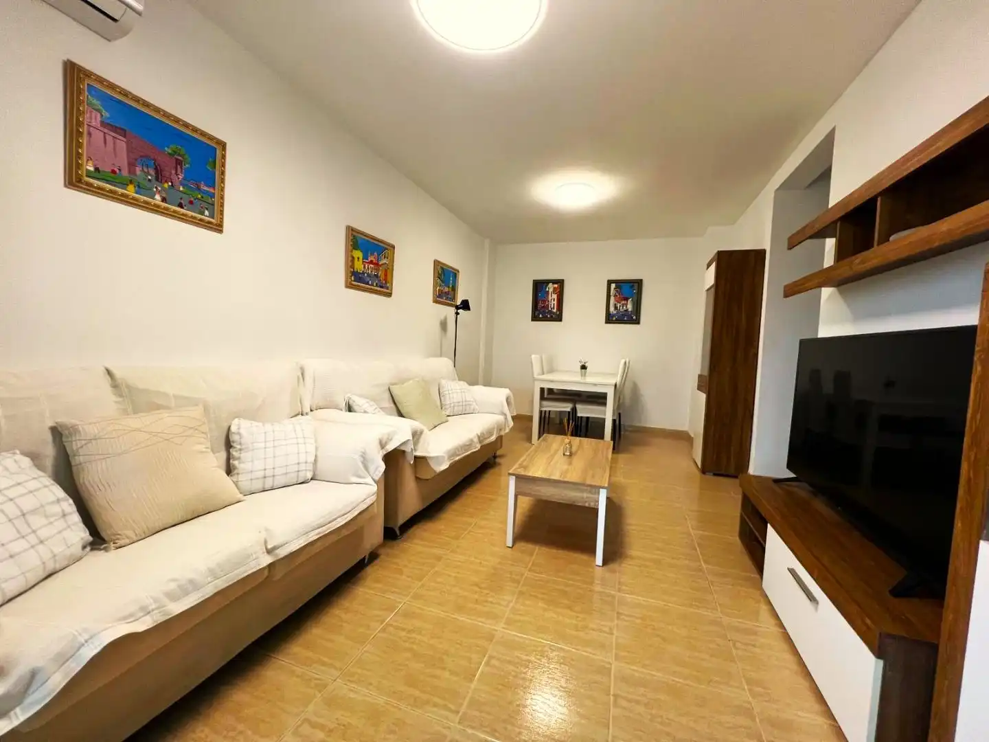 Sala d'estar de Pis de lloguer en Daimús amb Aire condicionat, Jardí privat i Terrassa
