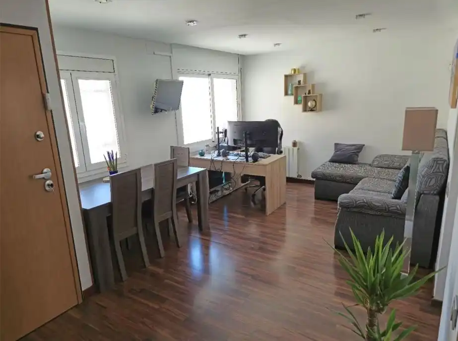 Sala d'estar de Dúplex en venda en Badalona amb Aire condicionat, Calefacció i Moblat