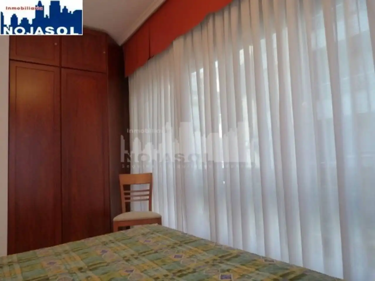 Dormitori de Apartament de lloguer en Noja amb Calefacció, Jardí privat i Terrassa