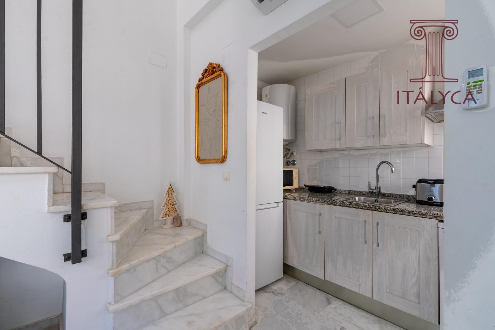 Kitchen of Duplex for sale in Sanlúcar la Mayor  with Air Conditioner, Terrace and Storage room