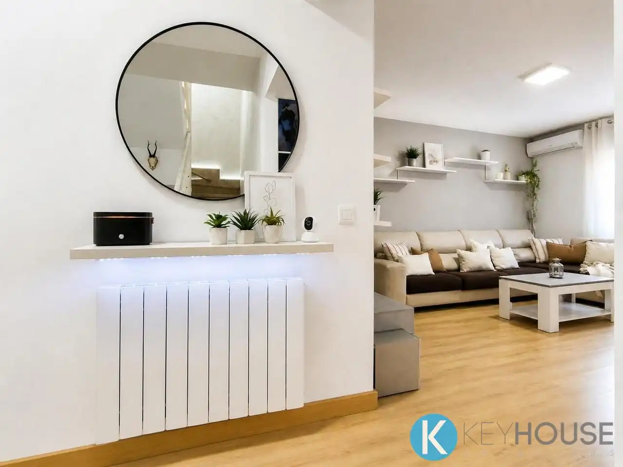 Sala de estar de Casa adosada en venta en Villalbilla con Aire acondicionado, Calefacción y Jardín privado
