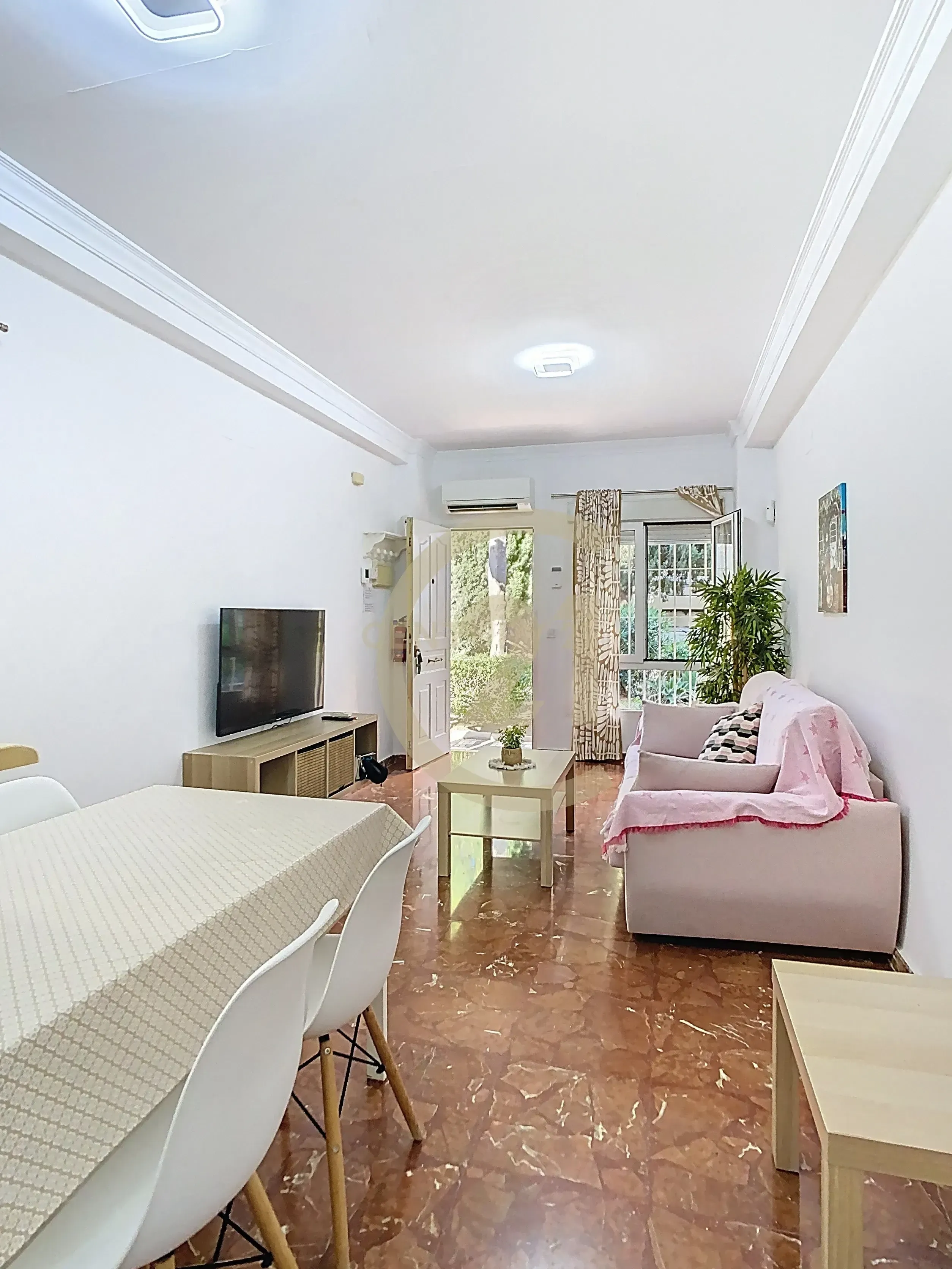 Living room of Flat for sale in Benalmádena  with Air Conditioner and Swimming Pool