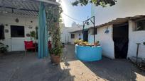 Vista exterior de Casa o xalet en venda en Sanlúcar la Mayor amb Terrassa