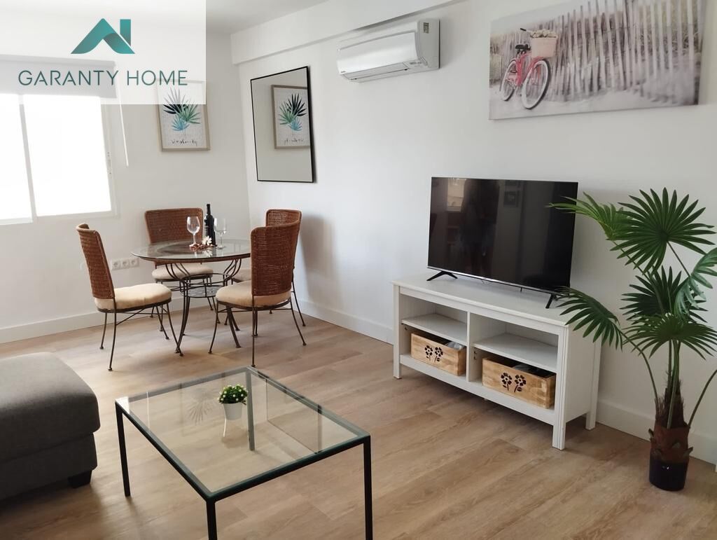 Sala d'estar de Pis de lloguer en Vélez-Málaga amb Aire condicionat