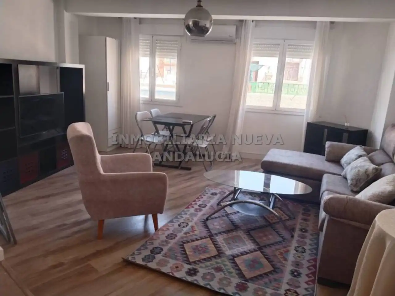 Sala d'estar de Pis de lloguer en Almería amb Aire condicionat i Moblat