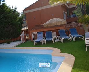 Swimming pool of House or chalet for sale in Riudecanyes  with Air Conditioner, Heating and Private garden