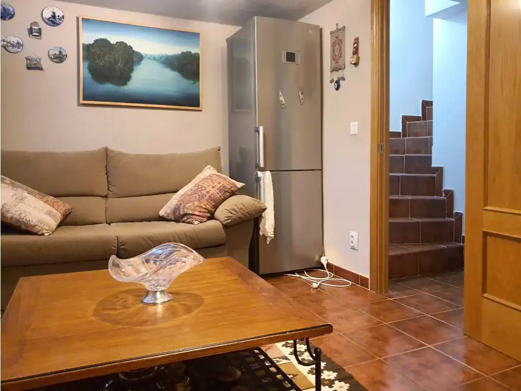 Sala d'estar de Casa adosada en venda en Colmenar Viejo amb Aire condicionat, Jardí privat i Terrassa