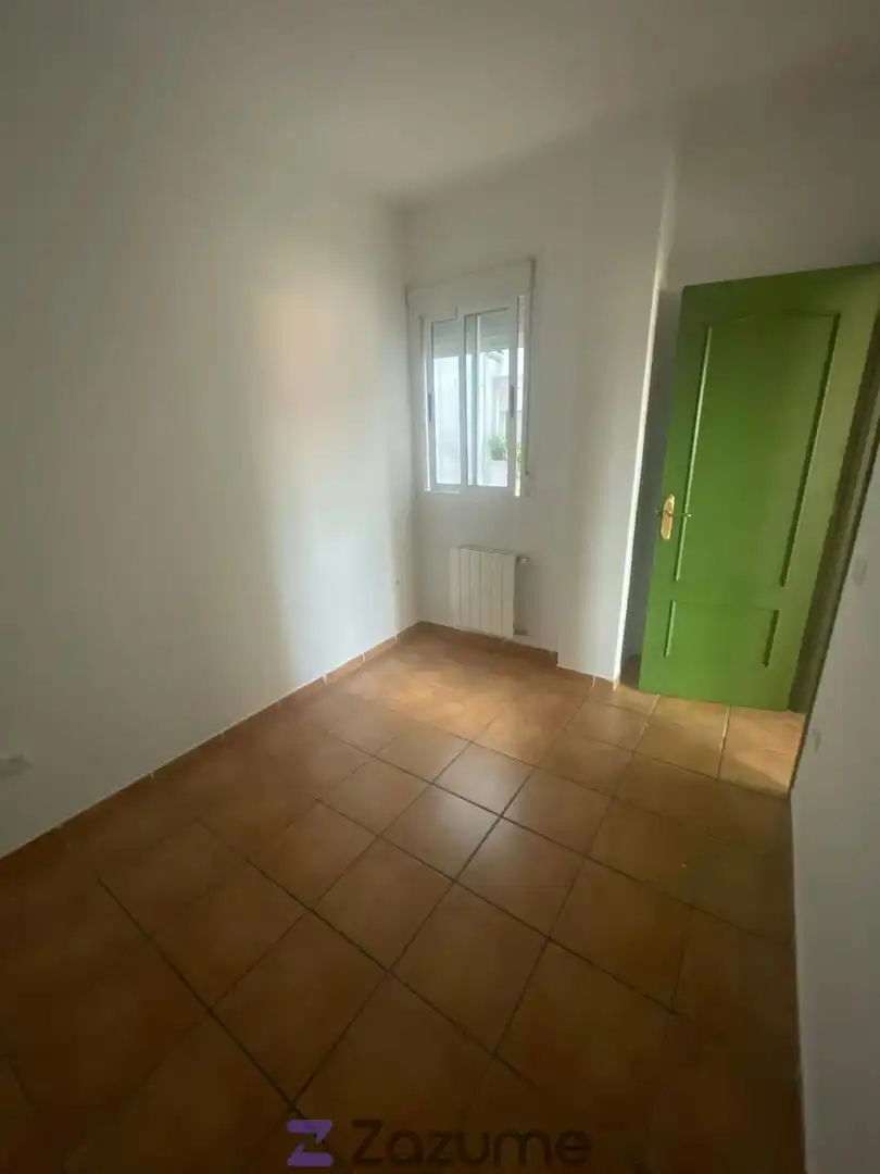 Dormitori de Apartament de lloguer en Zafra amb Jardí privat, Piscina i Forn