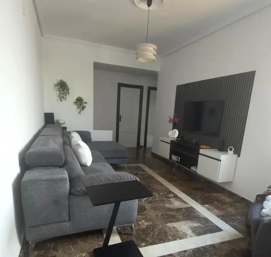 Sala d'estar de Casa adosada en venda en La Unión amb Aire condicionat, Jardí privat i Terrassa