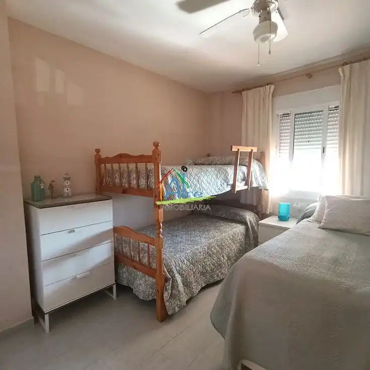 Dormitori de Apartament en venda en Almonte amb Aire condicionat, Terrassa i Piscina comunitària