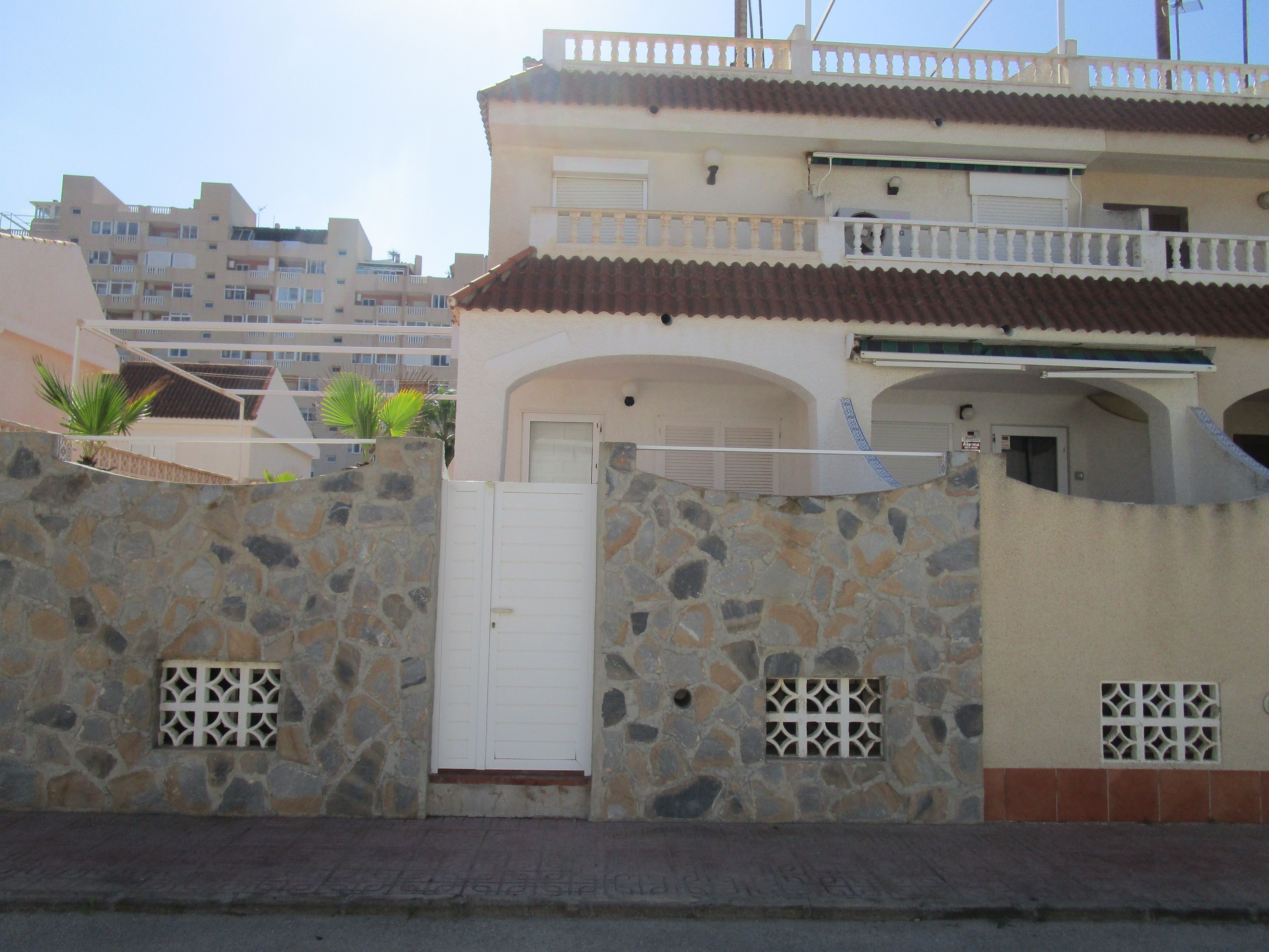 Exterior view of Single-family semi-detached for sale in La Manga del Mar Menor  with Terrace, Storage room and Furnished