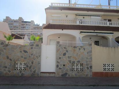 Vista exterior de Casa adosada en venda en La Manga del Mar Menor amb Terrassa, Traster i Moblat