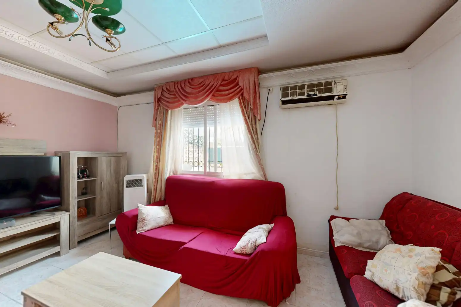 Sala d'estar de Casa adosada en venda en Cartagena amb Aire condicionat i Jardí privat