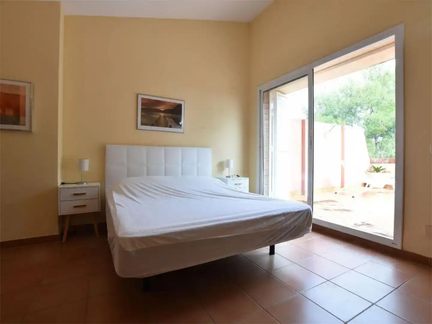 Dormitori de Apartament de lloguer en Tarragona amb Aire condicionat, Jardí privat i Piscina