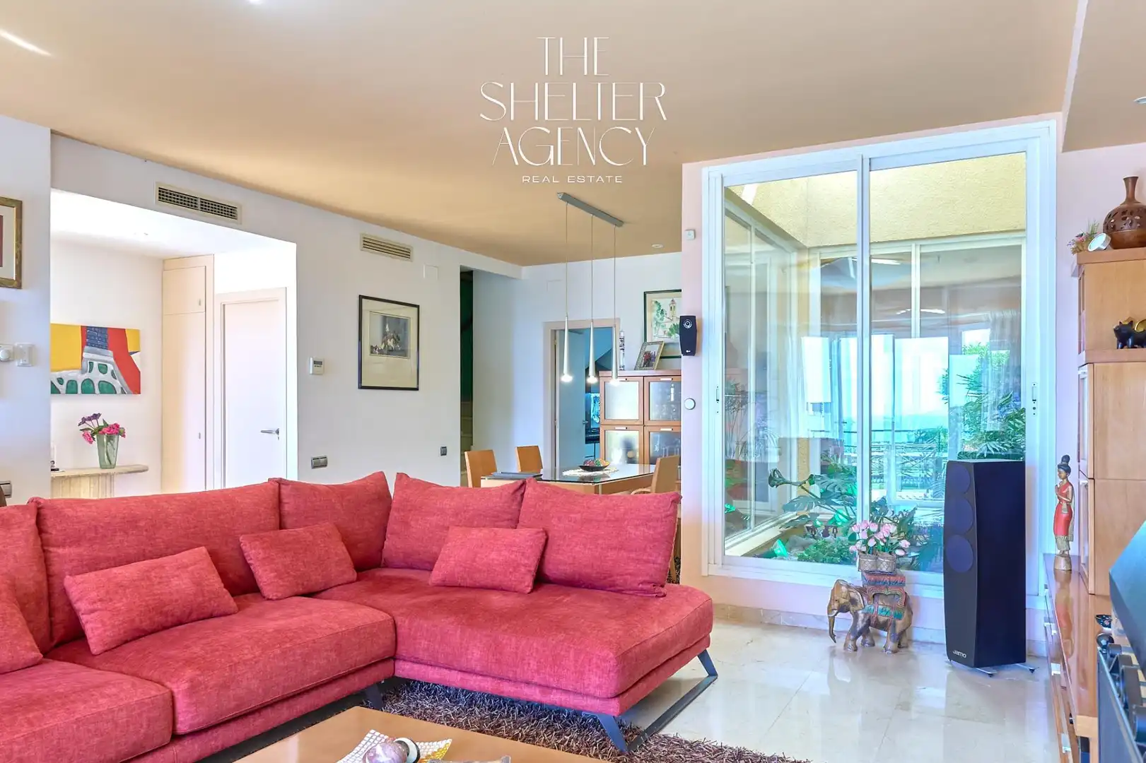Sala d'estar de Casa adosada en venda en Sitges amb Calefacció, Jardí privat i Terrassa