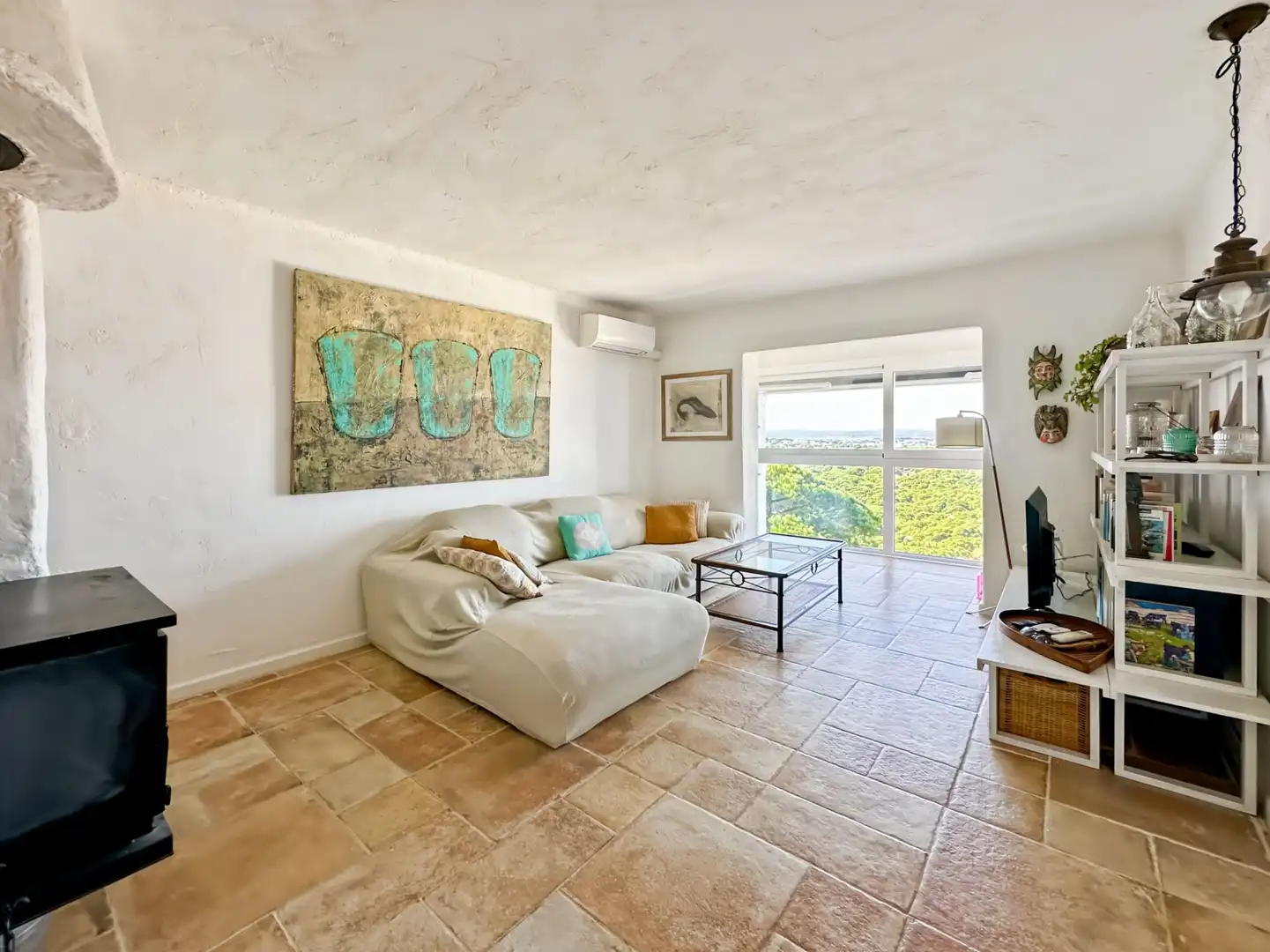 Sala d'estar de Casa adosada en venda en L'Escala amb Aire condicionat, Calefacció i Terrassa