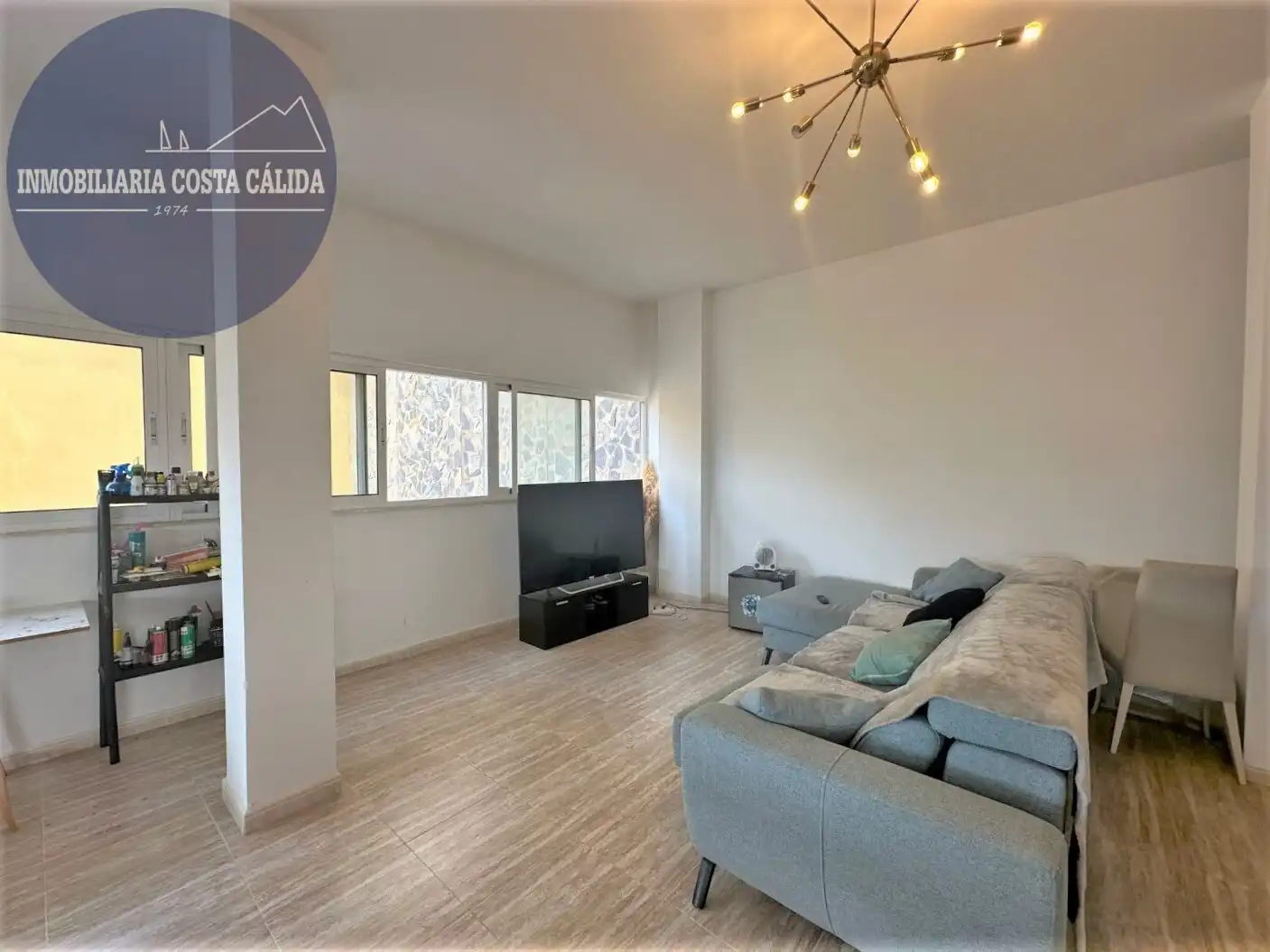 Sala de estar de Casa adosada en venta en Águilas con Aire acondicionado, Calefacción y Jardín privado