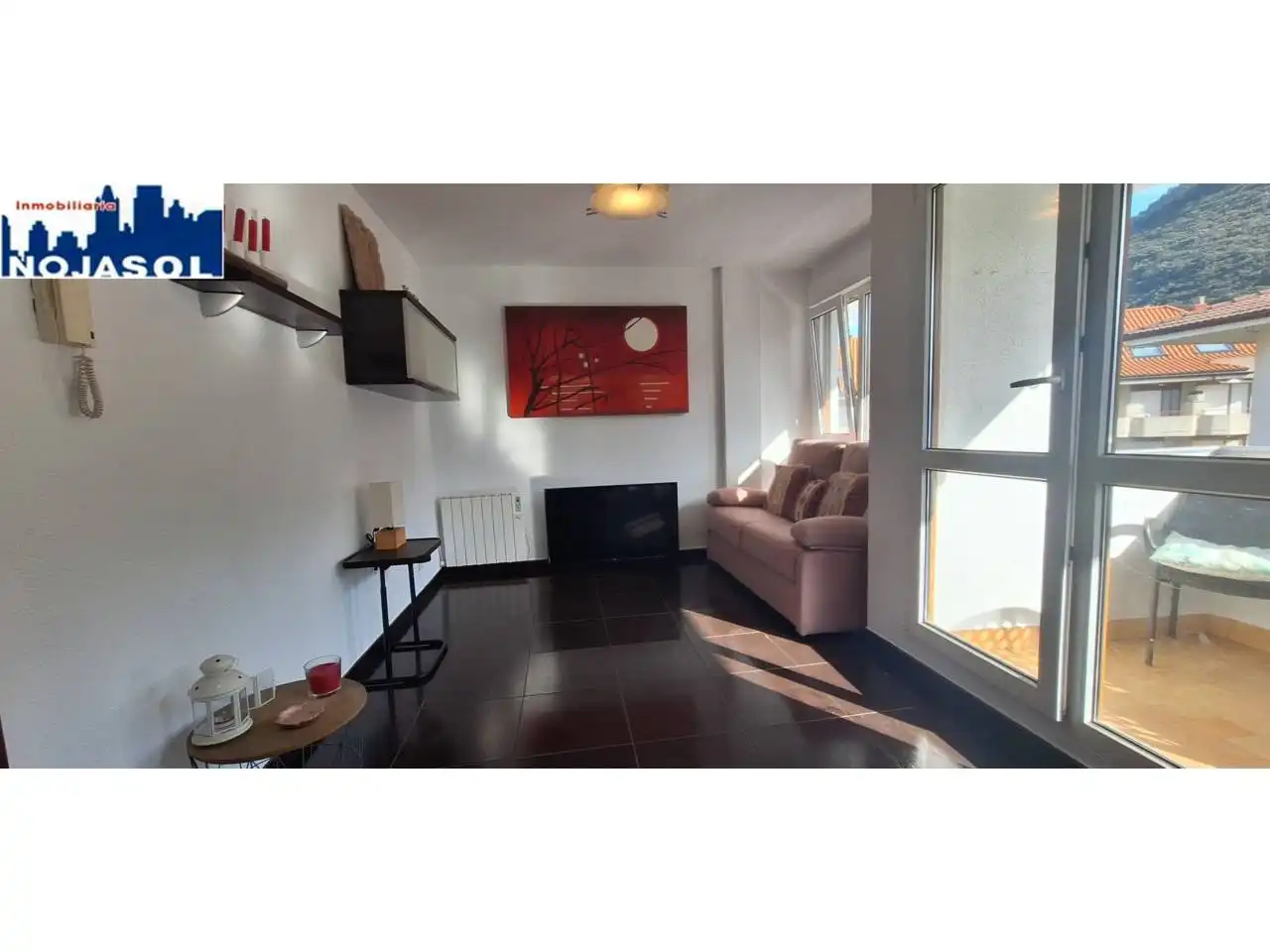 Sala d'estar de Apartament de lloguer en Noja amb Calefacció, Terrassa i Moblat