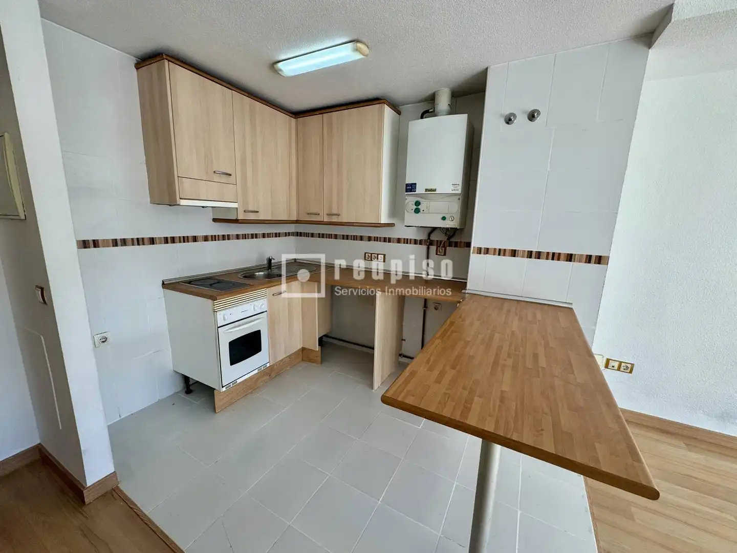 Cuina de Apartament en venda en El Escorial amb Calefacció, Jardí privat i Terrassa